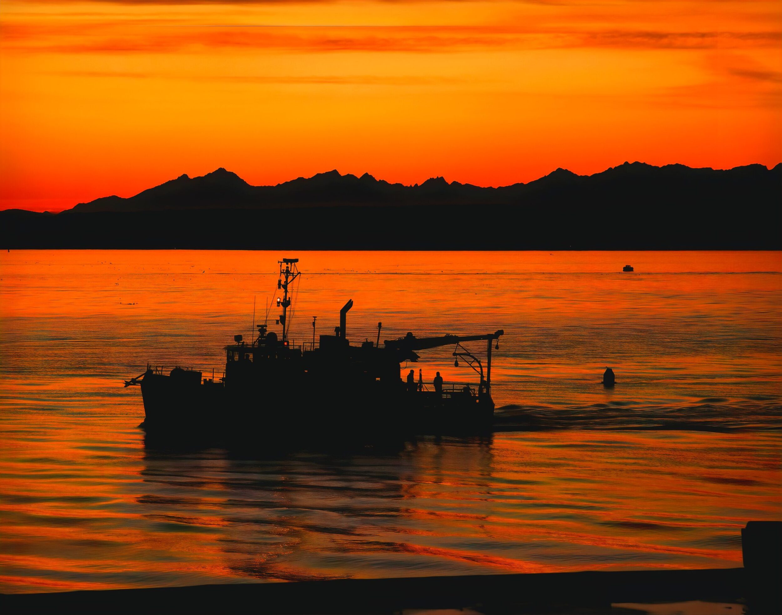 Don’t get caught! Puget Sound fishing boat at sunset photo by Jack Prichett on Unsplash