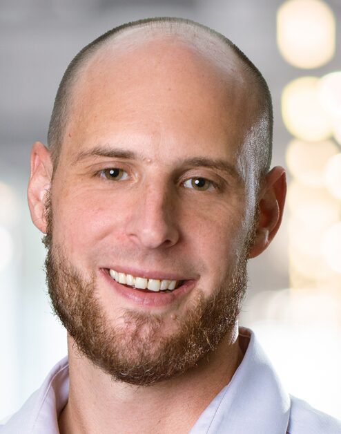 a headshot of Dan Tritch of Your Part-Time Controller